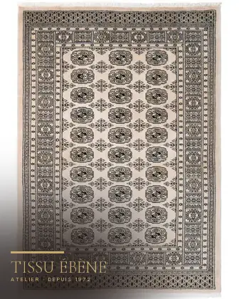 Tapis Boukhara 1910 après — bordures et franges restaurées